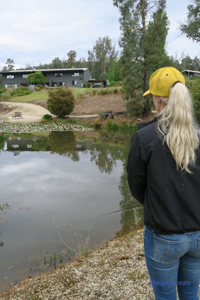 Woman learning to fly fish.