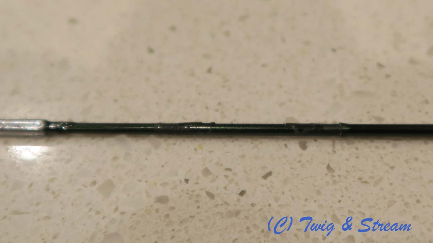 Old rod guide removed, and most of the old epoxy removed.